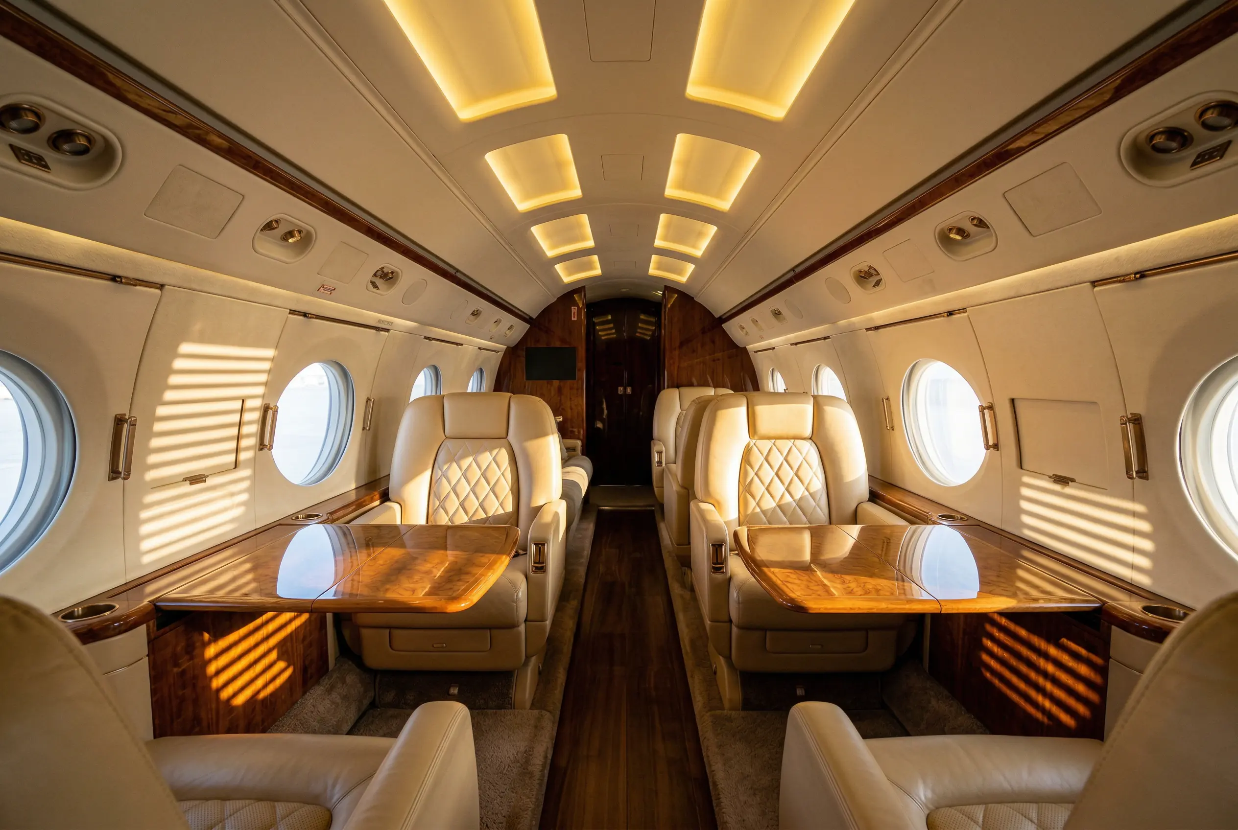 Gulfstream G550 cabin interior with leather club seating and conference layout
